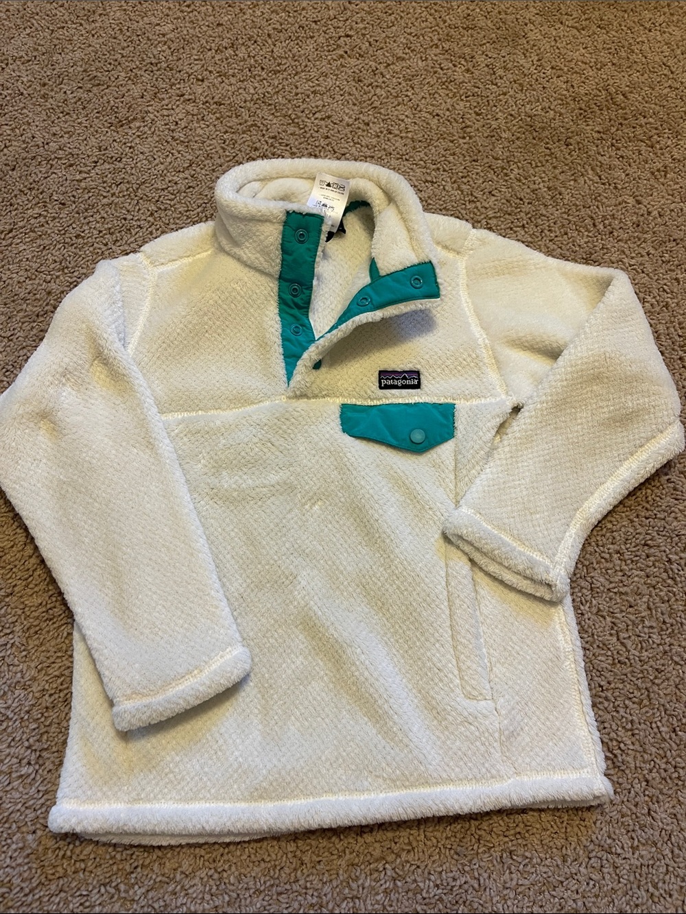 Patagonia Kids Cream Fleece Pullover with Teal Snap Placket